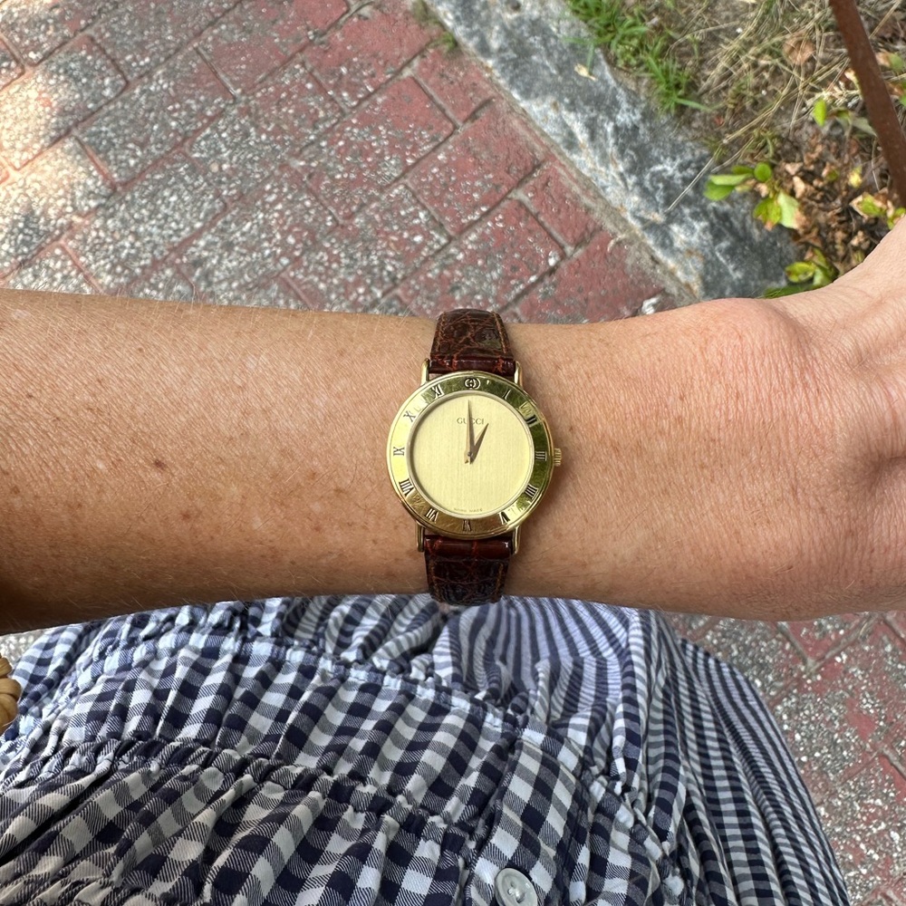 Gold Gucci Watch